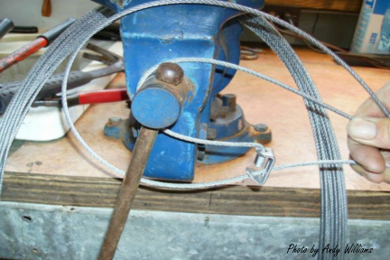 Boarmasters Loading Cable on Vise